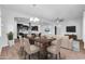 Dining area connects to a stylish kitchen and a comfortable living room at 10141 E Stealth Ave, Mesa, AZ 85212