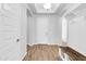 Elegant entryway with tray ceiling, archways, and access to other rooms at 10141 E Stealth Ave, Mesa, AZ 85212