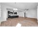 Spacious area features a modern kitchen and flexible living space at 10141 E Stealth Ave, Mesa, AZ 85212