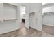 Large walk-in closet with ample shelving and rods at 10141 E Stealth Ave, Mesa, AZ 85212
