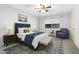 Comfortable bedroom showcasing neutral tones, carpet flooring, and a view of the outside at 10314 W Manzanita Dr, Sun City, AZ 85373