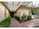 Covered walkway with pergola leads to the front door at 10314 W Manzanita Dr, Sun City, AZ 85373