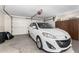 Garage with ample space for one car and additional storage at 10314 W Manzanita Dr, Sun City, AZ 85373