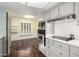 Modern kitchen with stainless steel appliances and a breakfast bar at 10314 W Manzanita Dr, Sun City, AZ 85373