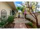 Private backyard patio with brick pavers and landscaping at 10314 W Manzanita Dr, Sun City, AZ 85373
