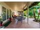 Brick patio with table and chairs, offering a peaceful outdoor space at 10314 W Manzanita Dr, Sun City, AZ 85373