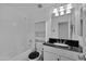 Clean bathroom with a bathtub, shower, and granite vanity at 10873 W Carlota Ln, Peoria, AZ 85373