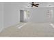 Bright bedroom featuring neutral wall paint and carpet at 10873 W Carlota Ln, Peoria, AZ 85373
