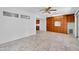 Bright dining area with built-in wooden cabinets and tile floors at 10873 W Carlota Ln, Peoria, AZ 85373