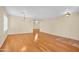 Dining room with hardwood floors and a chandelier at 10873 W Carlota Ln, Peoria, AZ 85373