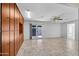 Gathering room with tile floors, built-in cabinets, and sliding glass doors at 10873 W Carlota Ln, Peoria, AZ 85373