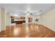 Living room features hardwood floors and a ceiling fan at 10873 W Carlota Ln, Peoria, AZ 85373