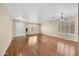 Bright living room with hardwood floors and lots of natural light at 10873 W Carlota Ln, Peoria, AZ 85373