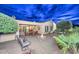 Inviting backyard patio with fire pit and seating area at 12750 W Nogales Dr, Sun City West, AZ 85375
