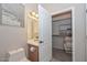 Bathroom with toilet and access to a walk-in closet at 12750 W Nogales Dr, Sun City West, AZ 85375