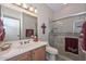 Clean bathroom with single sink and walk-in shower at 12750 W Nogales Dr, Sun City West, AZ 85375