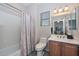 Clean bathroom with shower/tub combo and updated vanity at 12750 W Nogales Dr, Sun City West, AZ 85375