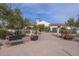 Community center with fountain and landscaping at 12750 W Nogales Dr, Sun City West, AZ 85375