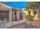 Private courtyard with seating area and decorative gate at 12750 W Nogales Dr, Sun City West, AZ 85375