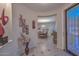 Bright entryway with view to dining area at 12750 W Nogales Dr, Sun City West, AZ 85375