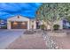 Beautiful single-story home with landscaped yard and two-car garage at 12750 W Nogales Dr, Sun City West, AZ 85375