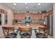 Island kitchen with granite countertops and stainless steel appliances at 12750 W Nogales Dr, Sun City West, AZ 85375