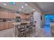 Kitchen with island, stainless steel appliances at 12750 W Nogales Dr, Sun City West, AZ 85375