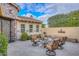 Relaxing patio with fire pit and comfortable seating at 12750 W Nogales Dr, Sun City West, AZ 85375