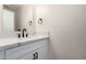 Stylish bathroom with white vanity, quartz countertop, and black matte fixtures at 1311 E Kelsi Ave, San Tan Valley, AZ 85140