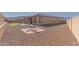 Spacious backyard with gravel, patio furniture, and a view of the surrounding landscape at 16221 S 35Th Dr, Phoenix, AZ 85045