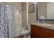 Clean bathroom with granite vanity, tub, and shower at 16221 S 35Th Dr, Phoenix, AZ 85045