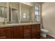 Double vanity bathroom with granite countertops at 16221 S 35Th Dr, Phoenix, AZ 85045
