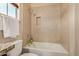 Clean bathroom with a tub and shower combo at 16221 S 35Th Dr, Phoenix, AZ 85045