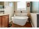 Relaxing bathroom with large soaking tub and updated fixtures at 16221 S 35Th Dr, Phoenix, AZ 85045
