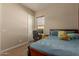 Bedroom with a double bed and ample closet space at 16221 S 35Th Dr, Phoenix, AZ 85045