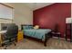 Bedroom with a double bed and a built-in desk at 16221 S 35Th Dr, Phoenix, AZ 85045
