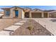 Beautiful desert landscape and two-car garage at 16221 S 35Th Dr, Phoenix, AZ 85045