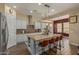Modern kitchen with granite island and stainless steel appliances at 16221 S 35Th Dr, Phoenix, AZ 85045