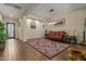 Open living area with a comfortable couch and area rug at 16221 S 35Th Dr, Phoenix, AZ 85045