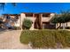 Inviting exterior of a condo building with landscaping and stairs at 1942 S Emerson -- # 231, Mesa, AZ 85210