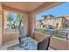 Private patio with seating area and views of community at 19777 N 76Th St # 1237, Scottsdale, AZ 85255