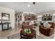 Open living area with a view into the kitchen at 21271 N 262Nd Dr, Buckeye, AZ 85396