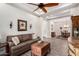 Cozy living area with a view into the dining area at 2238 N Acacia Way, Buckeye, AZ 85396