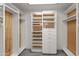 Spacious walk-in closet with ample shelving and hanging space at 23005 N 87Th St, Scottsdale, AZ 85255