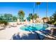 Inviting community pool with lounge chairs and surrounding patio at 23005 N 87Th St, Scottsdale, AZ 85255