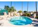 Community pool with lounge chairs and surrounding landscaping at 23005 N 87Th St, Scottsdale, AZ 85255