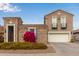 Stunning two-story home with stone facade and attached garage at 2378 E Wisteria Dr, Chandler, AZ 85286