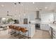 Modern kitchen with white cabinets and large island at 2378 E Wisteria Dr, Chandler, AZ 85286