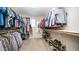 Spacious walk-in closet with ample shelving and hanging space at 2389 E Hazeltine Way, Gilbert, AZ 85298