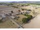 Aerial view of a ranch-style house with a pool and large lot at 2419 S 200Th Ln, Buckeye, AZ 85326